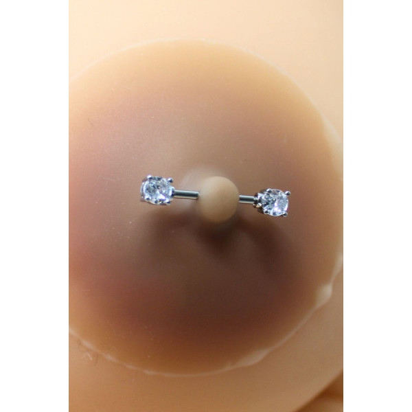 Paire de cache-tétons piercing barre faux diamant peau métisse 